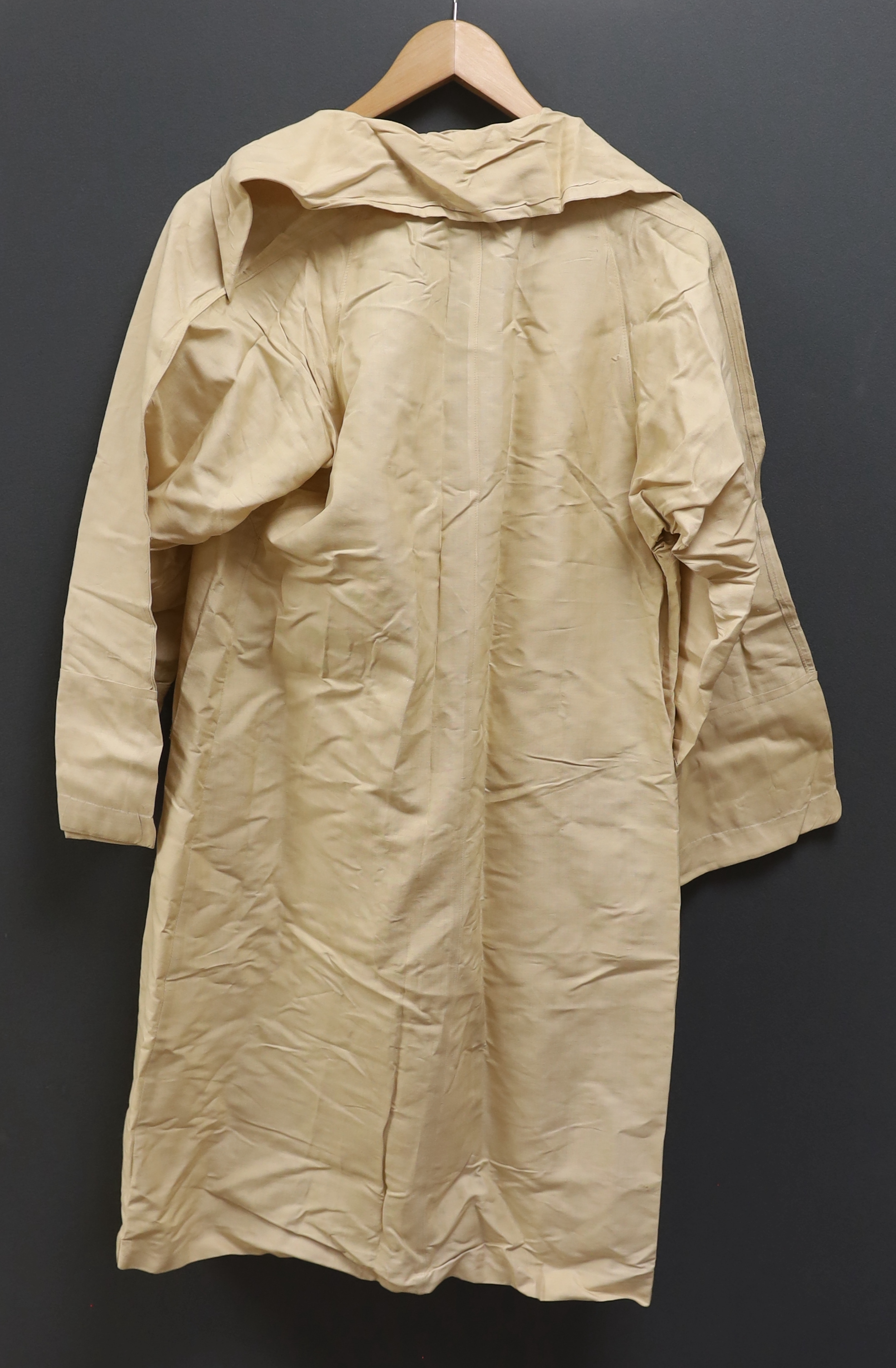 A ladies 20th century cream shantung silk summer duster coat